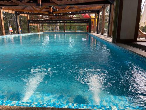 Cabañas y Hosteria El Condor Pasa VLA (Cabanas y Hosteria El Condor Pasa VLA) in วิลล่า ลา แองกอสทุร่า