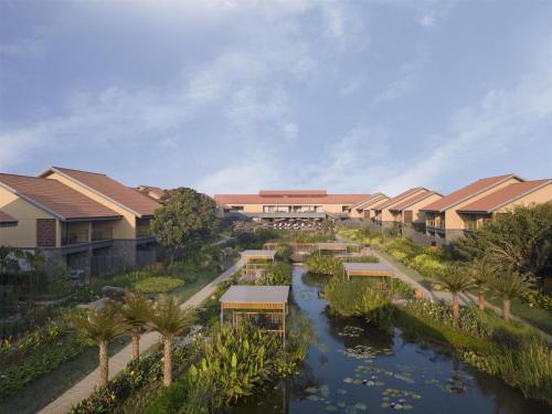Hilton Hyderabad Genome Valley Resort & Spa, India - Photos, Room Rates &  Promotions