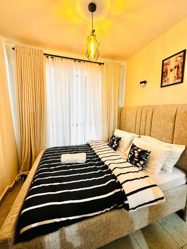 Rodney's homes, Cosy 1 bedroom – khách sạn tại Mirema