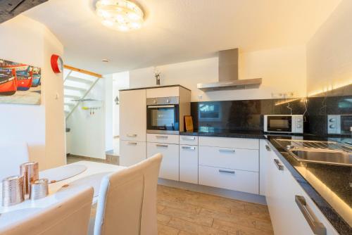 virtuve, Ferienhaus Achtern Diek in Karolinenkoga