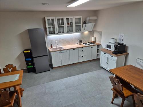 Kitchen, INLE Homestay in Nova Lesna