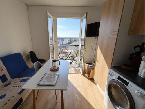 Appartement 28m2 avec balcon proche gare SNCF, café thé WIFI gratuits - Netflix - Balcon