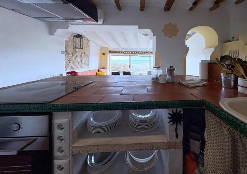 Casa con vistas al mar y Patio de Buganvillas in Aigues