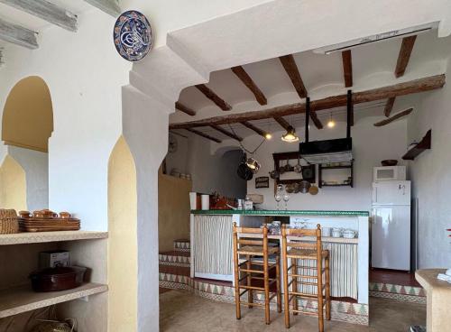 Casa con vistas al mar y Patio de Buganvillas in Aigues