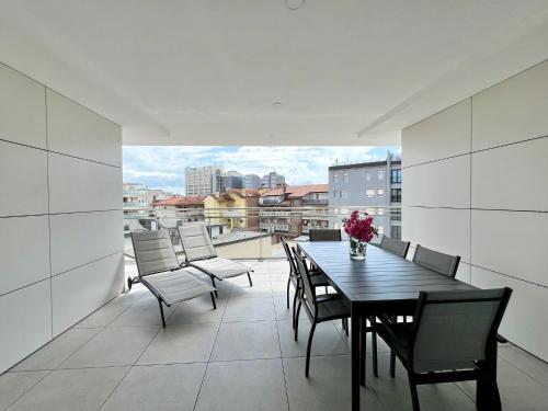 Bright apartment with balconies