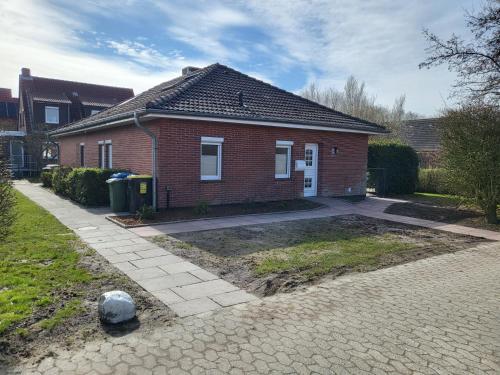 Экстерьер, Ferienhaus Norderny direkt am Deich, Fledderweg 8 in Norddeich in Норден