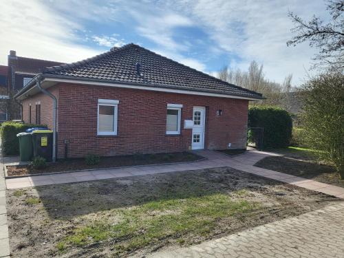 Экстерьер, Ferienhaus Norderny direkt am Deich, Fledderweg 8 in Norddeich in Норден