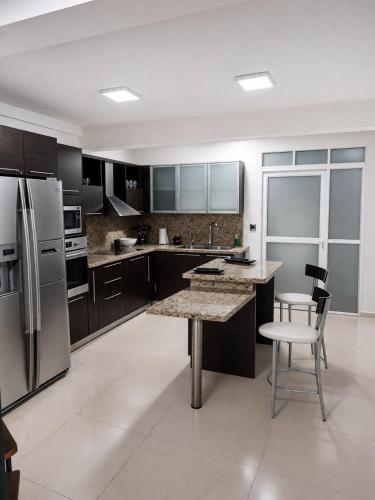 Kitchen, Beautiful townhouse close to the beach in Puerto La Cruz