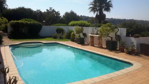 Swimming pool, Chez Esme Guest House in Roodepoort