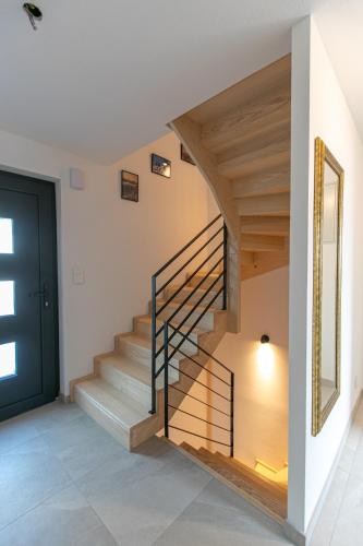 Maison au pied des falaises in Jougne