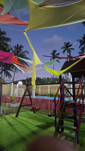 Playground, On the road to happiness Tucacas, with a beach and brackish water con agua salobre in Boca de Aroa