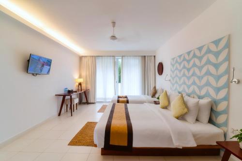 Naiya Sea Resort Room Type - Triple Room with Garden View