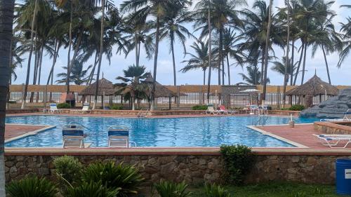 En el camino de la felicidad ,Tucacas con playa privada complejo de agua salobre , 2 habitaciones ,  in Boca de Aroa