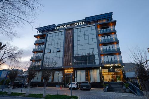 UNIQUE Airport Hotel - Tap to explore photos