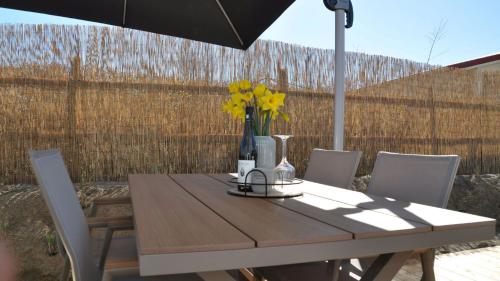 grădină, Ferienhaus Deichkoje - ANKERPLATZ DAHME, Haus in Dünengelände, Strandkorb, Gasgrill, WLAN (Ferienhaus Deichkoje - ANKERPLATZ DAHME, Haus in Dunengelande, Strandkorb, Gasgrill, WLAN) in Dahme
