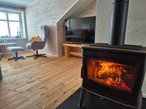 Molden Sky - takterrasse med egen jacuzzi! in Hafslo