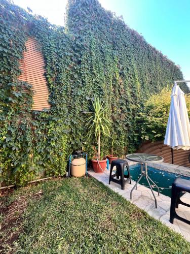 Acogedora Casa con quincho y piscina privada