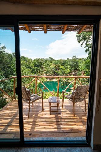 Cenote Escondido Cabañas y Camping
