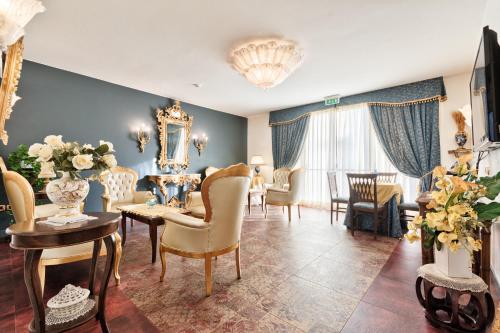 ห้องส่วนกลางสำหรับนั่งเล่น/ดูทีวี, Hotel Doge in วิเซนซ่า