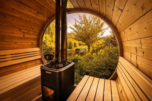 Dārzs, Wellness Tuin Horst Noord Limburg - 2-4 persoons Wellness Lodge met prive sauna stoomcabine en jacuz in Horst aan de Maas