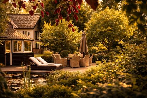 Viesnīcas āriene, Wellness Tuin Horst Noord Limburg - 2-4 persoons Wellness Lodge met prive sauna stoomcabine en jacuz in Horst aan de Maas