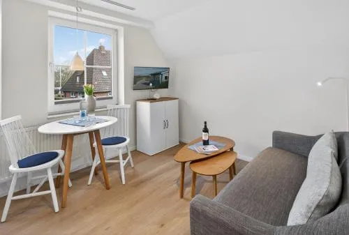 Lüttje Ginsterhuus - Ferienwohnung Wilde Brise in Norderney, Deutschland