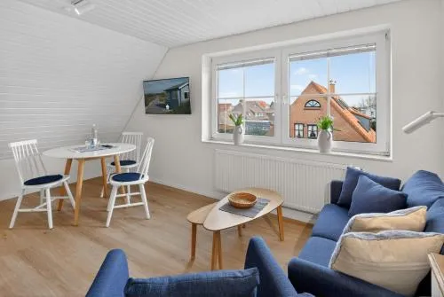 Lüttje Ginsterhuus - Ferienwohnung Südwind in Norderney, Deutschland