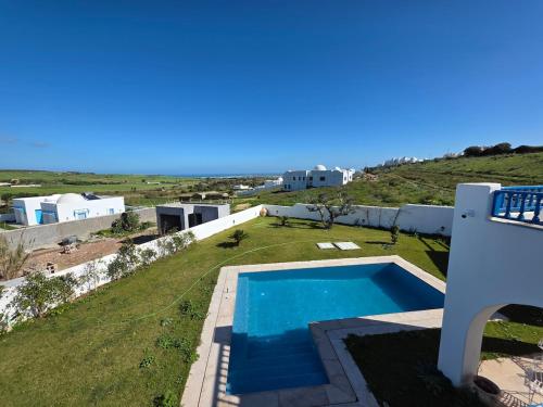 ViLLA DE MAITRE STYLE ARABE 4 SUITES PISCINE GRAND JARDIN in Ezzahra (Bin `Arus)