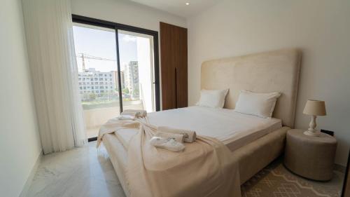 תוכנית בנייה, New 2BR · Sunny Balcony · Jardins Carthage in Jardins De Carthage