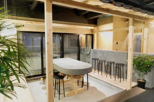 Shared lounge/TV area, MATSUMOTO CASTLE hostel in Matsumoto