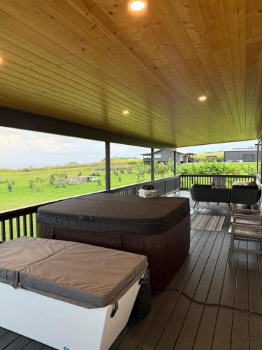 Luxury Farm Stay with Hot Tub, Cold Plunge and Cuddle Cows in Honomu (HI)