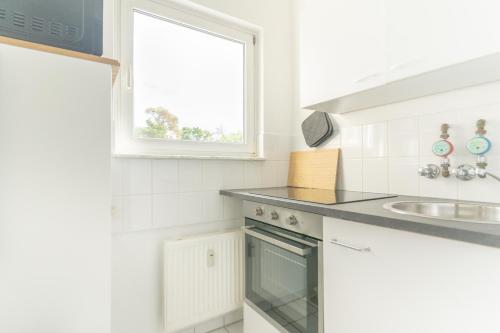 廚房, MR Living I modernes Apartment mit Einzelbetten, voll ausgestattete Kuche, Balkon, WLAN, Parkplatz,  in 林登