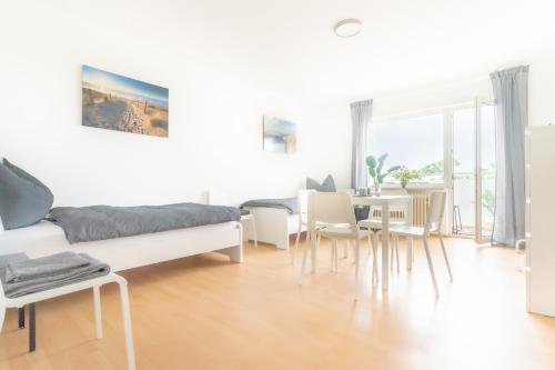MR Living I modernes Apartment mit Einzelbetten, voll ausgestattete Kuche, Balkon, WLAN, Parkplatz,  in 林登