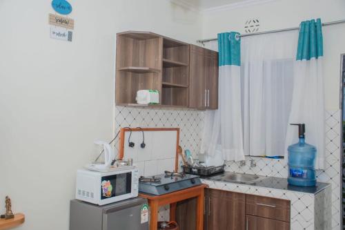 Sunday showers suites in Eldoret