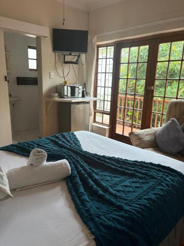 Arum Chine Guesthouse Room 1 – khách sạn tại Nahoon Mouth