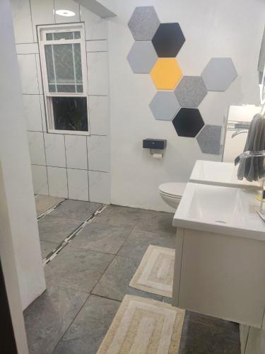 Baño, Cozy Stays in Oranjestad