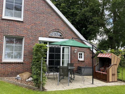 Altan/terrasse, Reihenhäuser in Strackholt (Reihenhauser in Strackholt) in Grossefehn