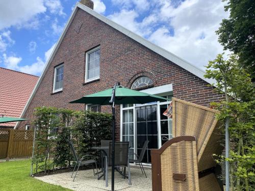 Altan/terrasse, Reihenhäuser in Strackholt (Reihenhauser in Strackholt) in Grossefehn