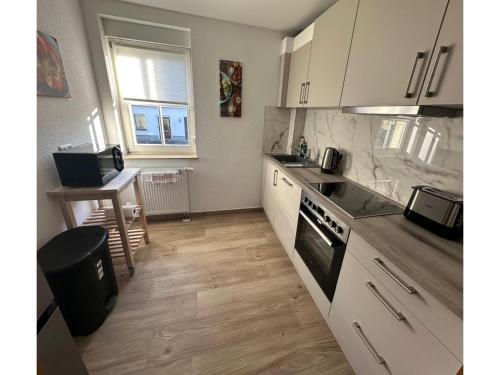 廚房, behagliche Ferienwohnung in Elstra in 潘施維茨-庫考