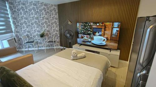 Cozy Condo with Arayat view in Azure North