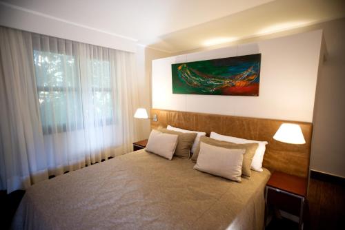 Hotel Guamini Mision Hotel Guaminí Misión is conveniently located in the popular Puerto Iguazu area. The property features a wide range of facilities to make your stay a pleasant experience. Service-minded staff will we