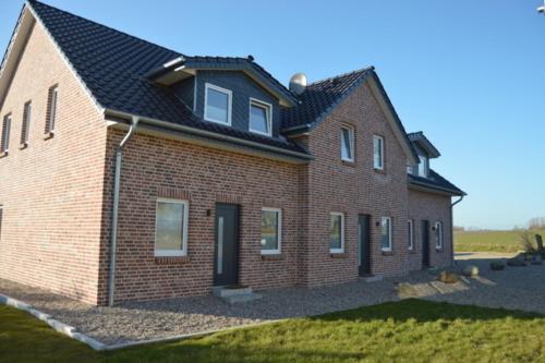Reihenhaus Nr2, inkl 2 Parkplätze – khách sạn tại Burg auf Fehmarn