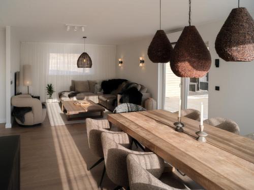 Waterfall Villa - Black Beach & Fjord Views in Karlsstaðir