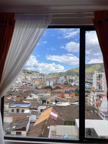 Apartaestudio Moderno con Vista a la Ciudad y senda del carnaval