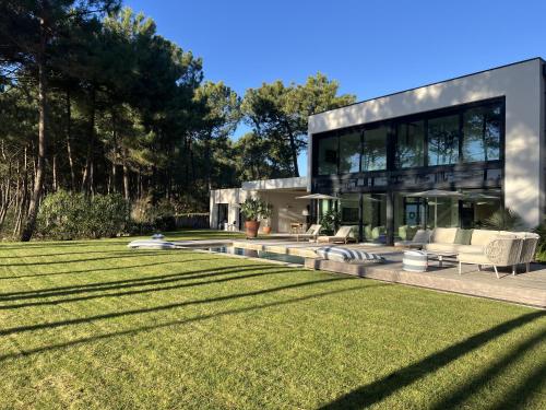 Villa Palmgreen avec piscine, face à la mer gîte à louer Plage de la Palmyre