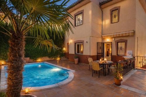 SUPERCASAJUN cerca de GRANADA PARKING PISCINA – khách sạn tại Norte