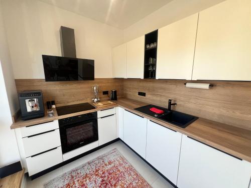 廚房, Moderne Ferienwohnung in Kleinheubach 24h Check in Fußbodenheizung Premium Ausstattung lichtdurchflu in 格羅斯伊巴赫