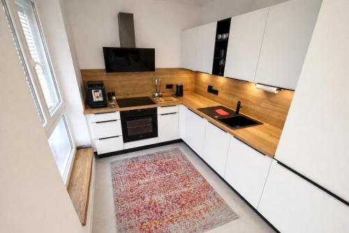 廚房, Moderne Ferienwohnung in Kleinheubach 24h Check in Fußbodenheizung Premium Ausstattung lichtdurchflu in 格羅斯伊巴赫