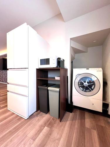 The Lobs Five, Brand New, 4 bedroom, 3 bath, 4 toilet, 8 min to Rusutsu, 7-11, bus at door in คิโมเบตสึ
