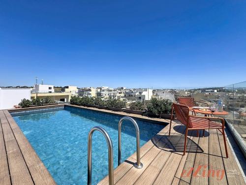 Pool, South 32 Hotel by Zzzing in Birzebbuga